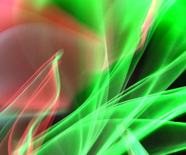 Abstract representation of flowing energy with golden light trails.